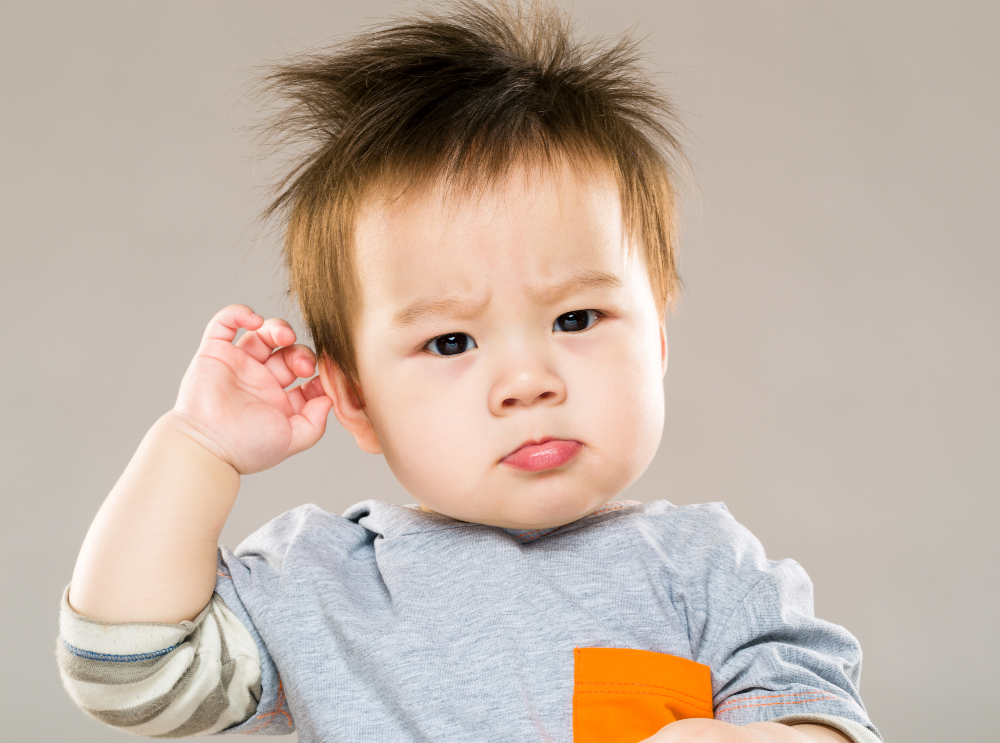 Ear Pulling in Babies Causes and What You Can Do About It