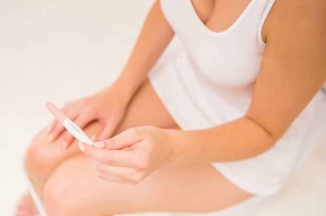 Is it better to pee on a pregnancy test or in a cup?